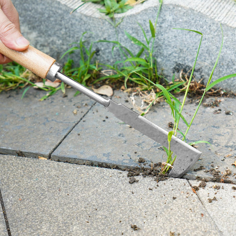 Kaimfdg L-shaped crack sickle slides between pavers for clean extraction.