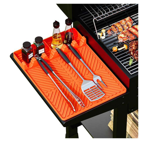 Kaisiking silicone grill mat on side shelf keeps tools organized and within easy reach.