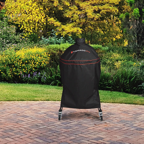 Kamado Joe Big Joe 24-inch cover side view shielding grill from wind and moisture.