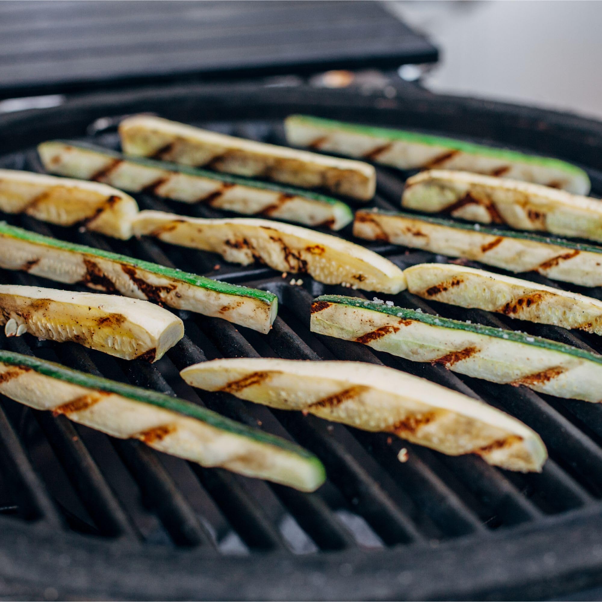 Kamado Joe half-moon grate improves flavor and presentation.