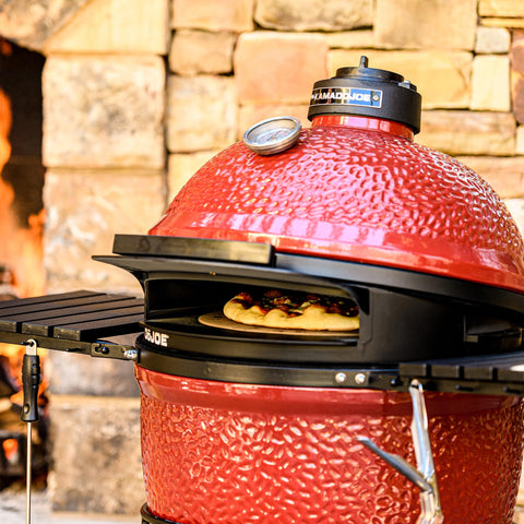 Kamado Joe DōJoe in use with hot, crispy crust
