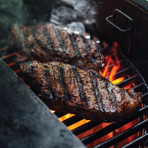 Kamado Joe durable cast-iron grate for high-heat use.