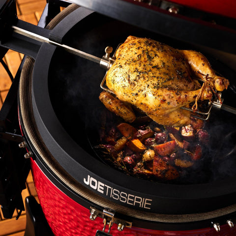 Kamado Joe Joetisserie adjustable forks for balanced load.