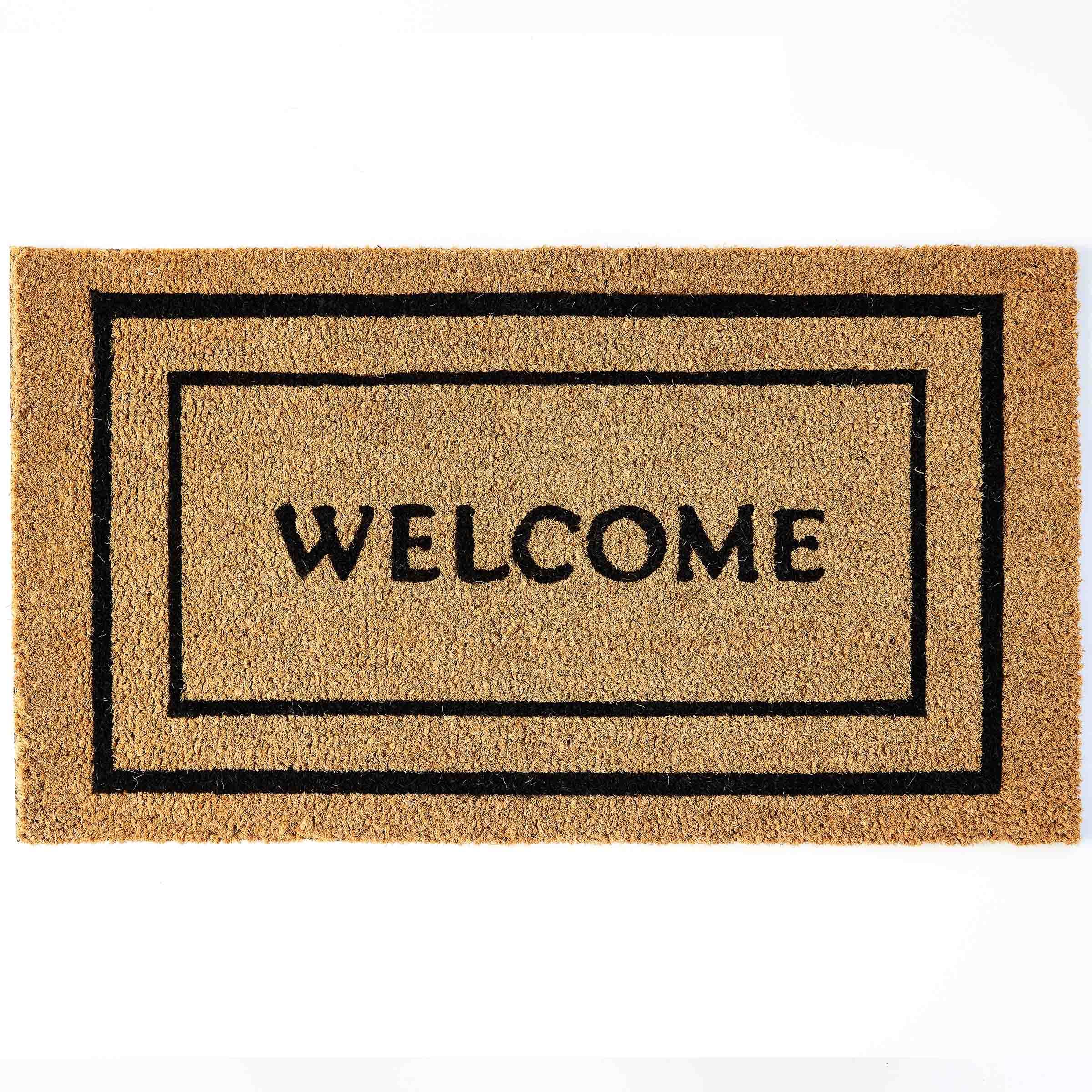 KANKUN Coco Coir Doormat at front door showing dirt scraping action