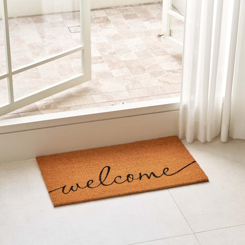 Natural fiber texture of KANKUN mat on a clean hallway floor