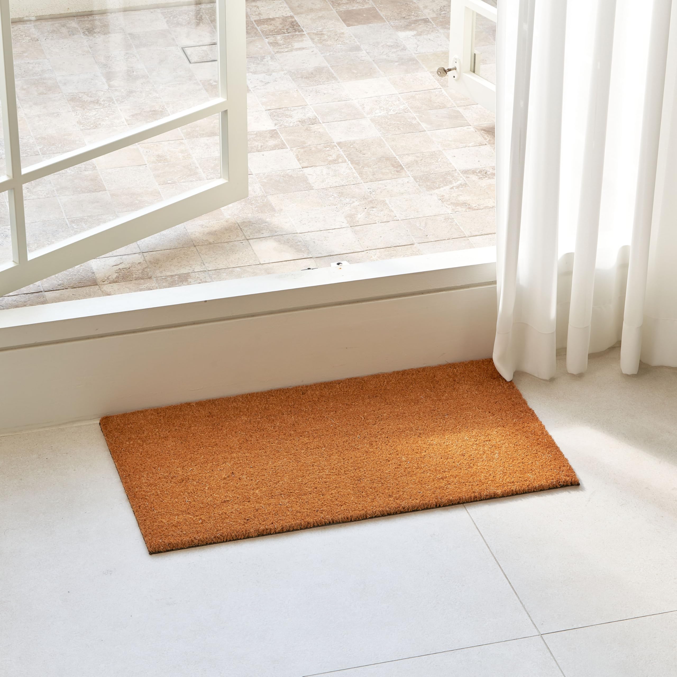 KANKUN welcome door mat close-up shows textured bristles for mud removal