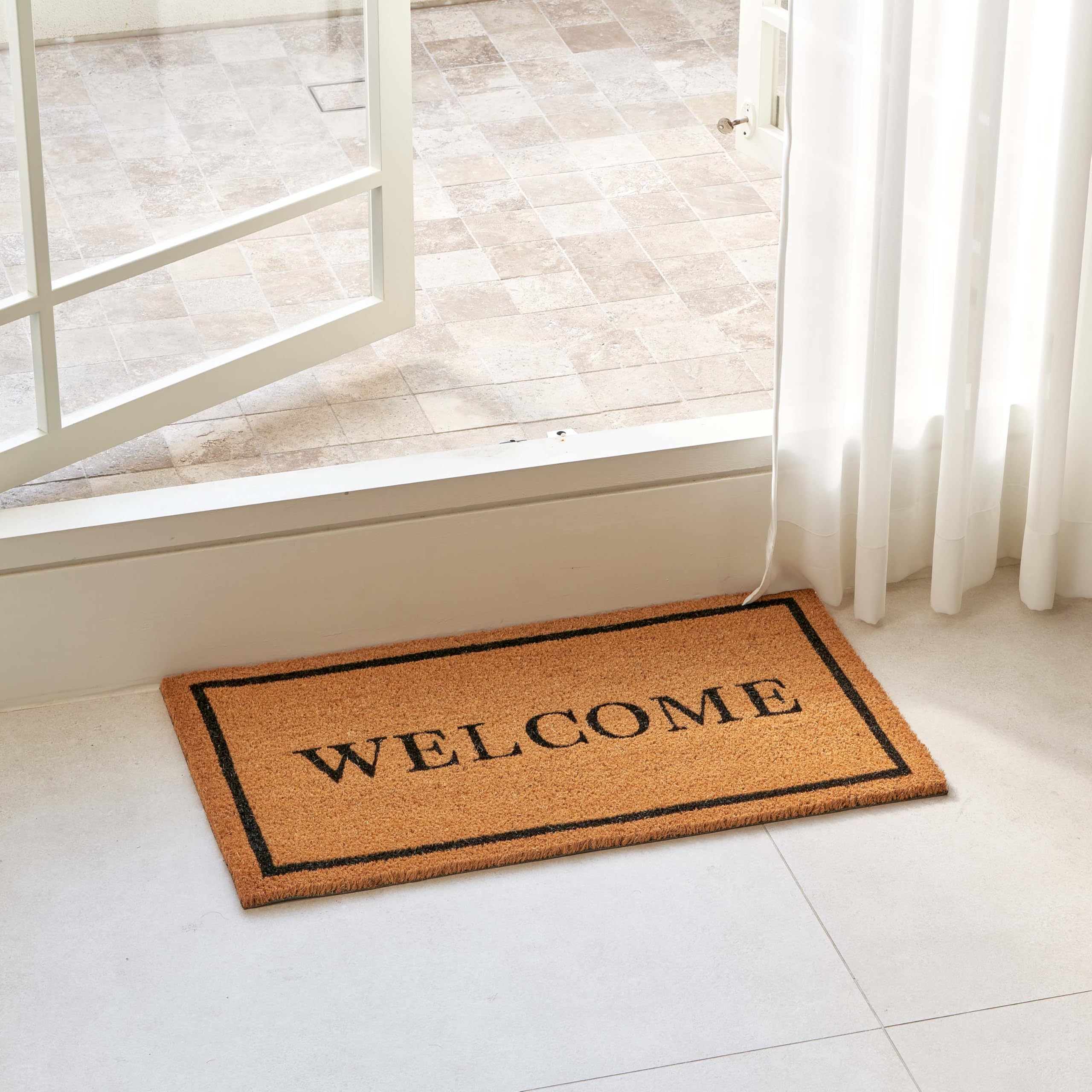KANKUN welcome doormat close-up with natural fibers for scrubbing dirt at entry