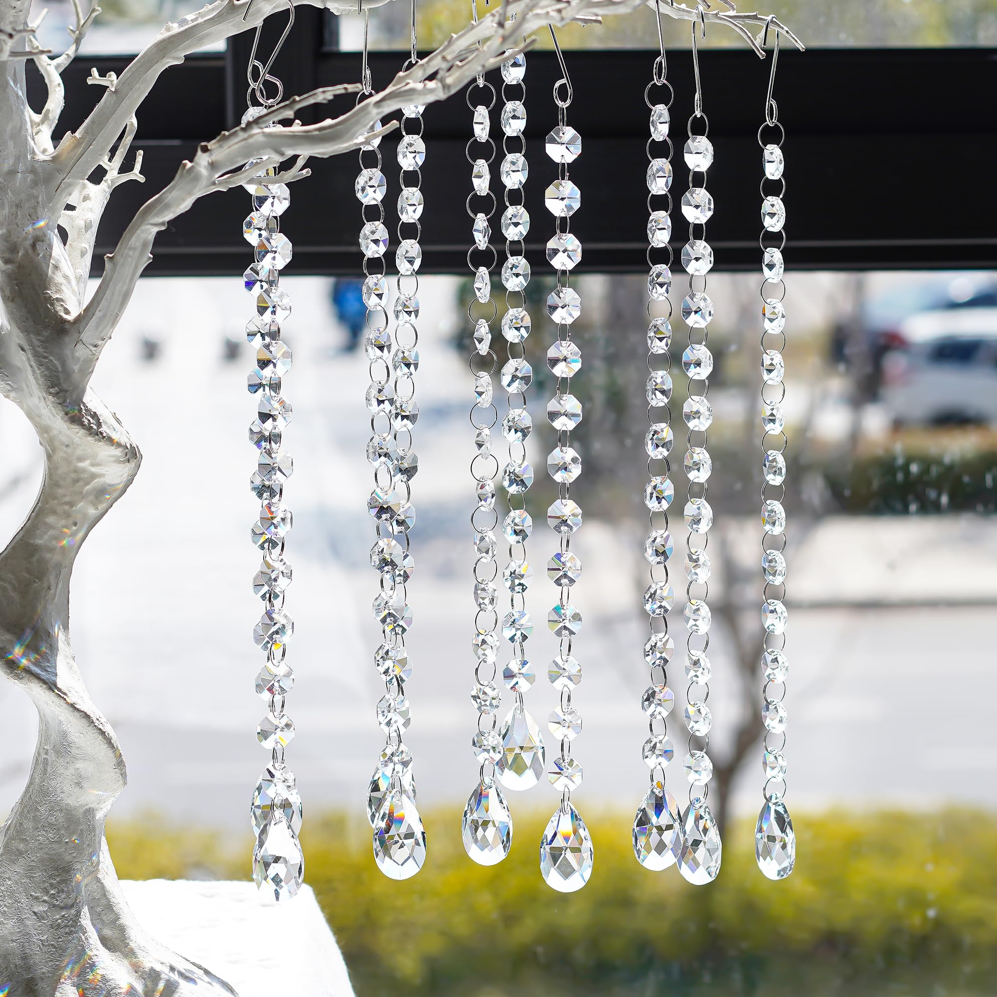KANPURA suncatcher crystal strands brighten windows with light play.