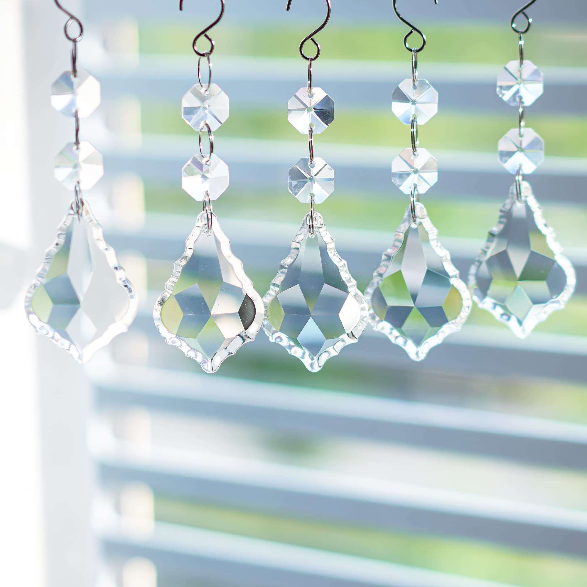 Kanpura crystal suncatcher prism collection creates vivid rainbow light displays.
