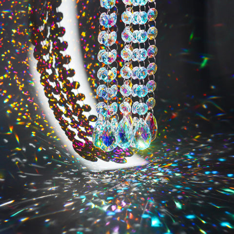 KANPURA teardrop crystal prisms for chandeliers create shimmering rainbow refractions in any room