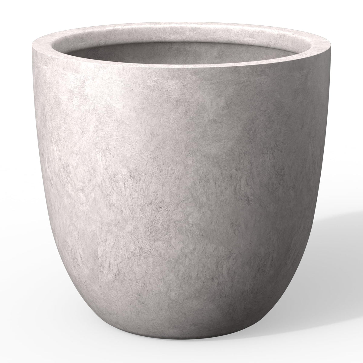 Kante 14-inch round concrete planter with lion head embossing adds bold focal point