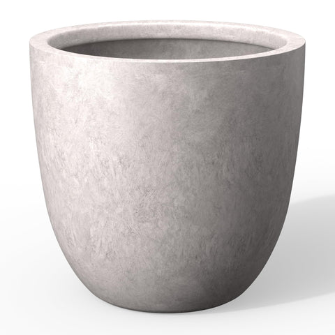 Kante 14-inch round concrete planter with lion head embossing adds bold focal point