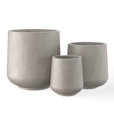 Kante round concrete planter, front view, sturdy and stylish addition to any patio or entryway.