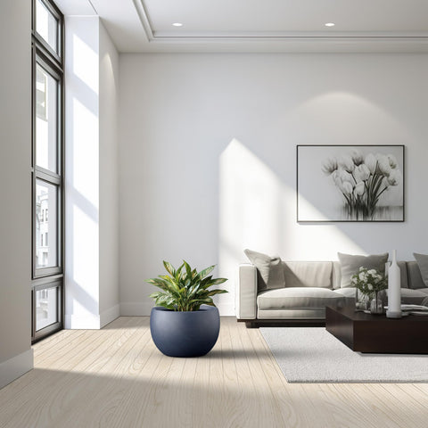 Kante charcoal finish planter highlighting smooth surface for sleek indoor or outdoor display.