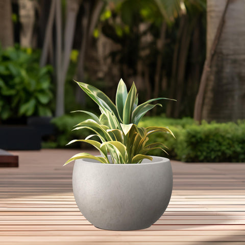 Kante planter with drainage hole and rubber plug for water control.