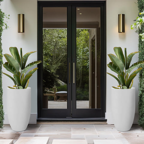 Kante concrete planter with smooth round design suits modern interiors.
