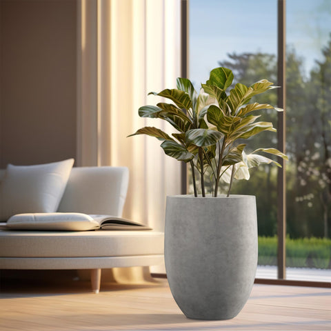 Outdoor patio scene with Kante tall planter for greenery and clean lines
