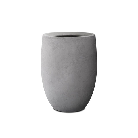 Smooth round taper of Kante planter complements contemporary decor