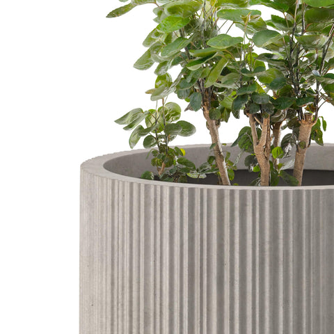 Kante contoured planter with visible pores for authentic charm.