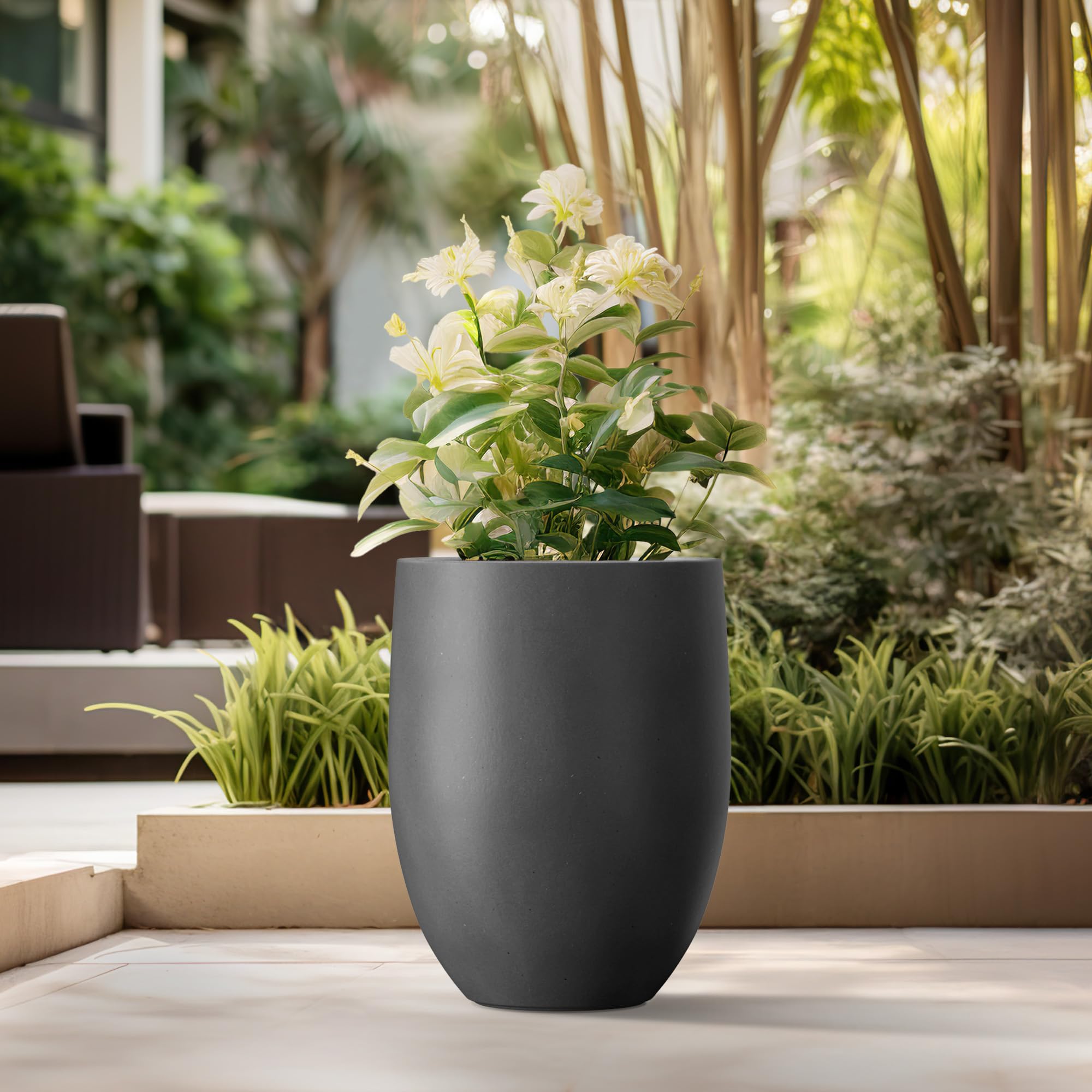 Kante planter features drainage hole and rubber plug for easy water management.