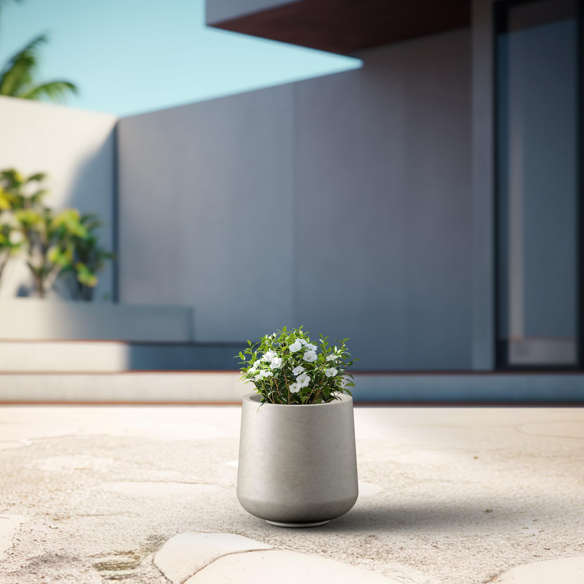 Kante large round planter for indoor and outdoor use in contemporary spaces