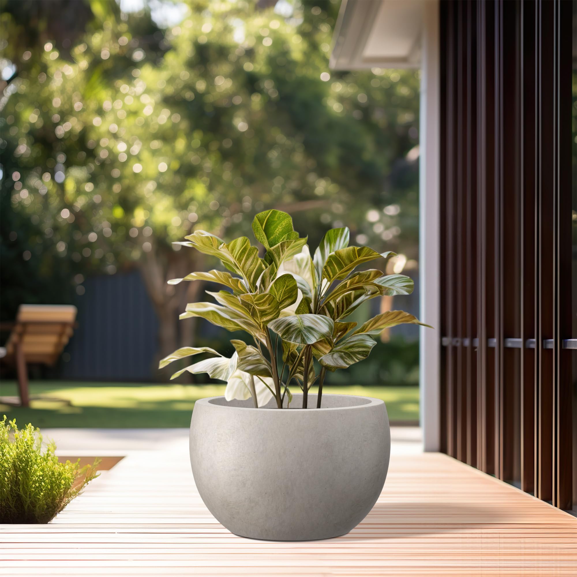 Kante lightweight concrete planter enables easy moving between spaces.