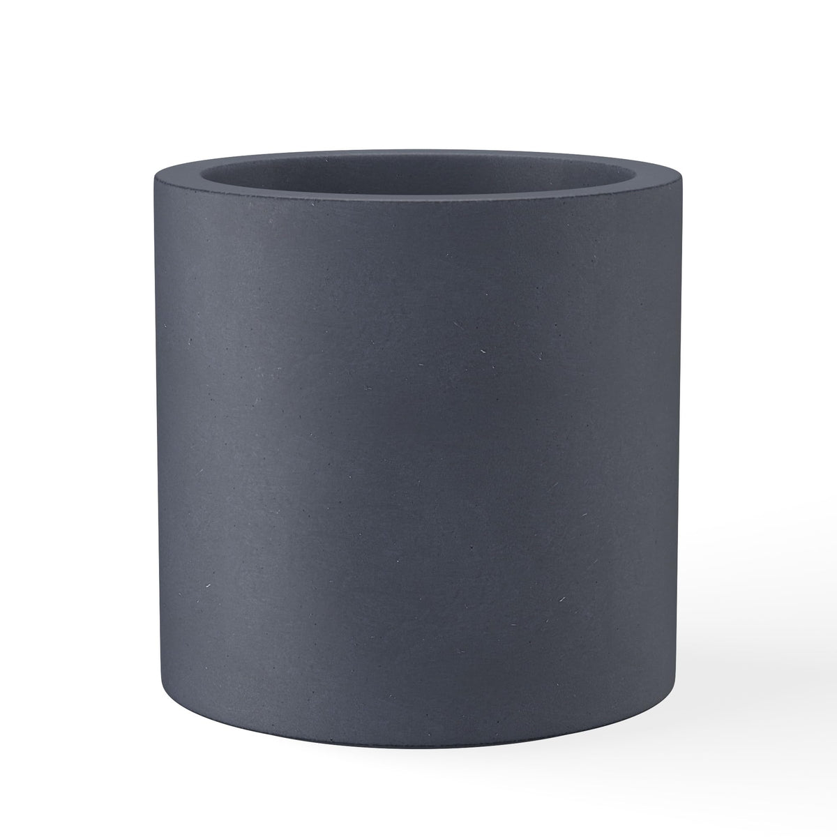 Kante round concrete planter surface detail adds modern texture to interiors.