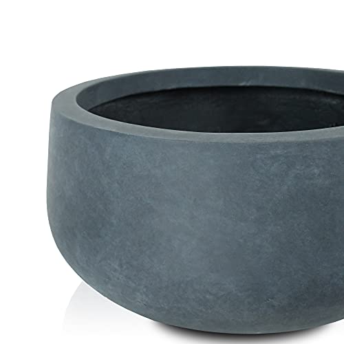 Kante smooth-finish concrete planter blends with modern decor.