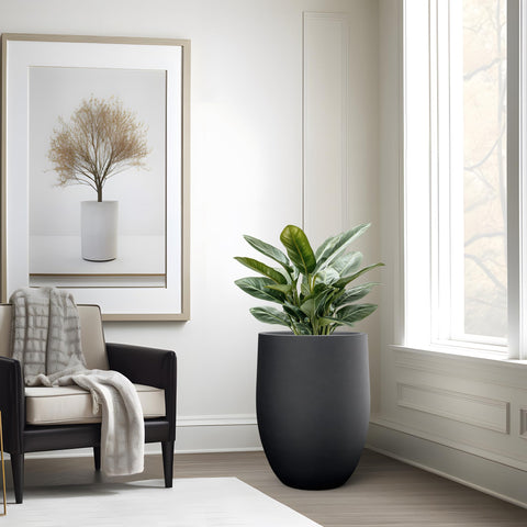 Kante tall planter offers generous planting space for trees or flowers.