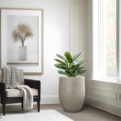 Kante large planter accommodates trees and flowering arrangements outdoors
