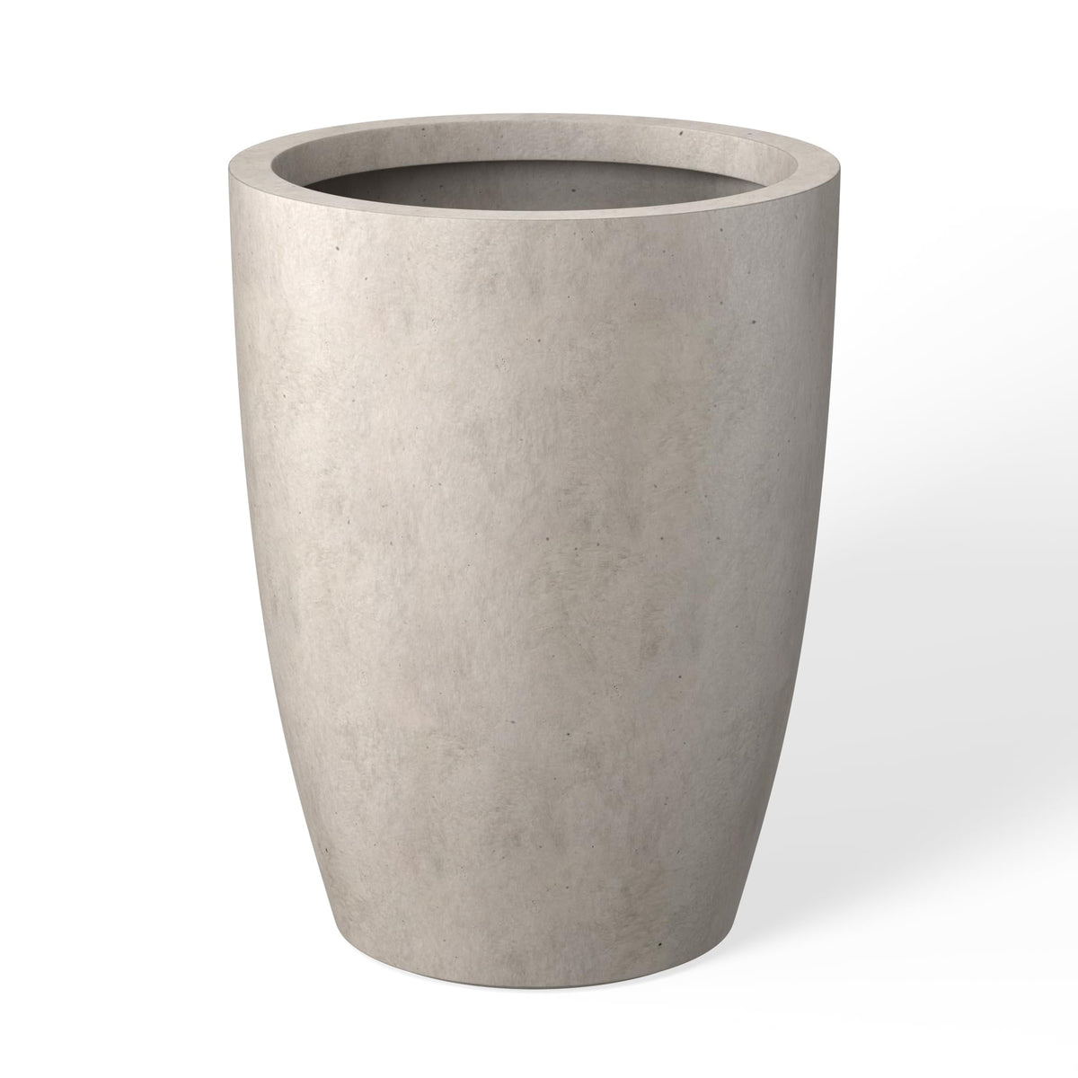 kante tall round concrete planter with weathered finish enhances indoor and outdoor spaces