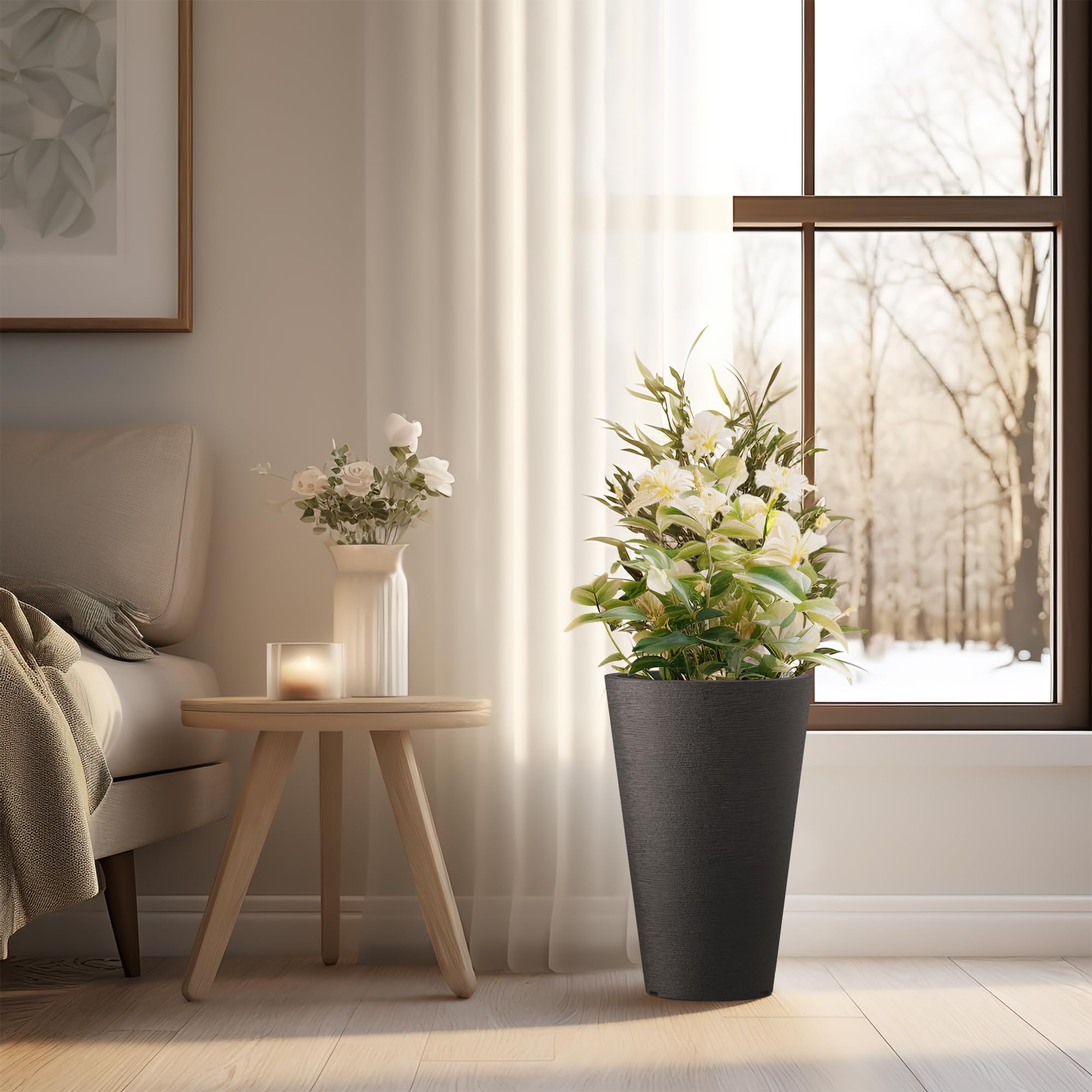 Kante tall round planter textured black surface enhances modern outdoor decor.