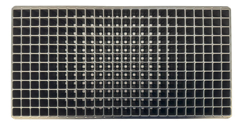 Kapok Candle Co 288-cell seedling tray in use with soil for seedlings