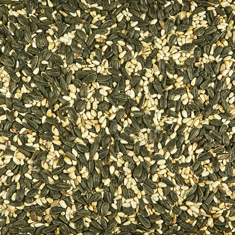 Kaytee Cardinal Wild Bird Seed bag closeup highlights premium blend for cardinals in the yard.