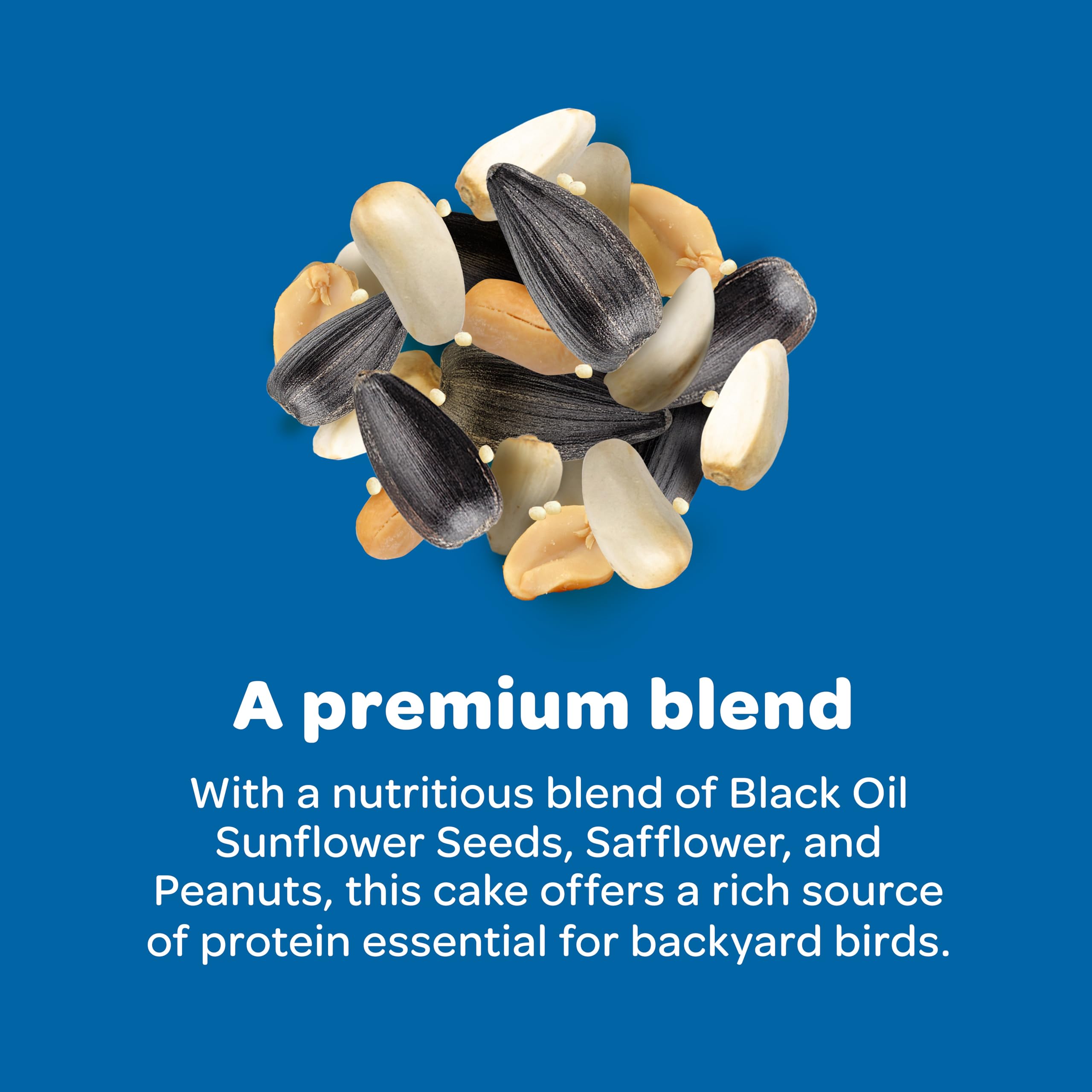 Kaytee Gourmet Seed Cake on garden post, attracting juncos for seasonal energy.