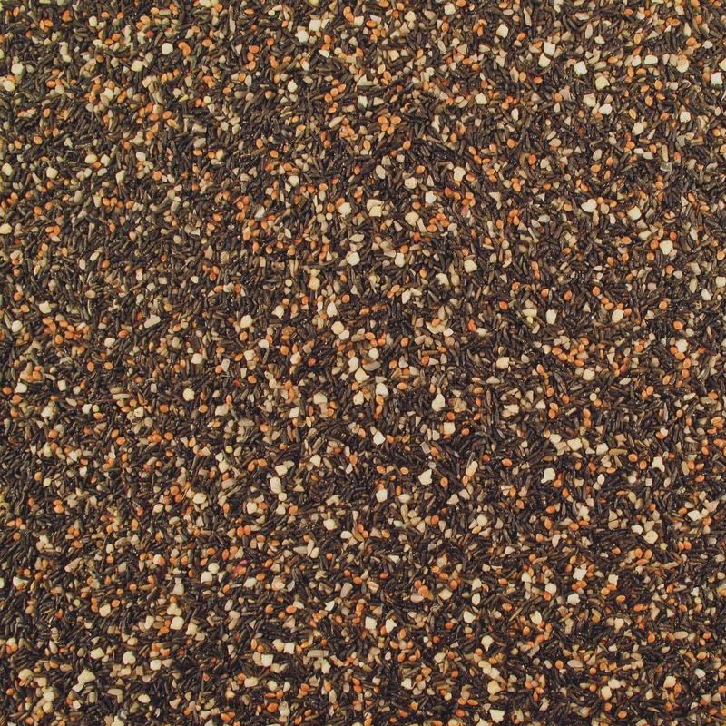 Close up of Kaytee Nyjer seed texture shows tiny energy rich grains.