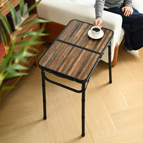 Kcmploro table with cloth pouch storage keeps utensils organized outdoors.