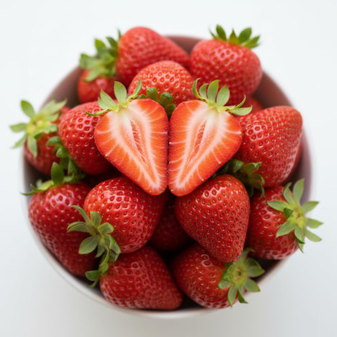 Sun-warmed strawberries ready to harvest at peak ripeness.