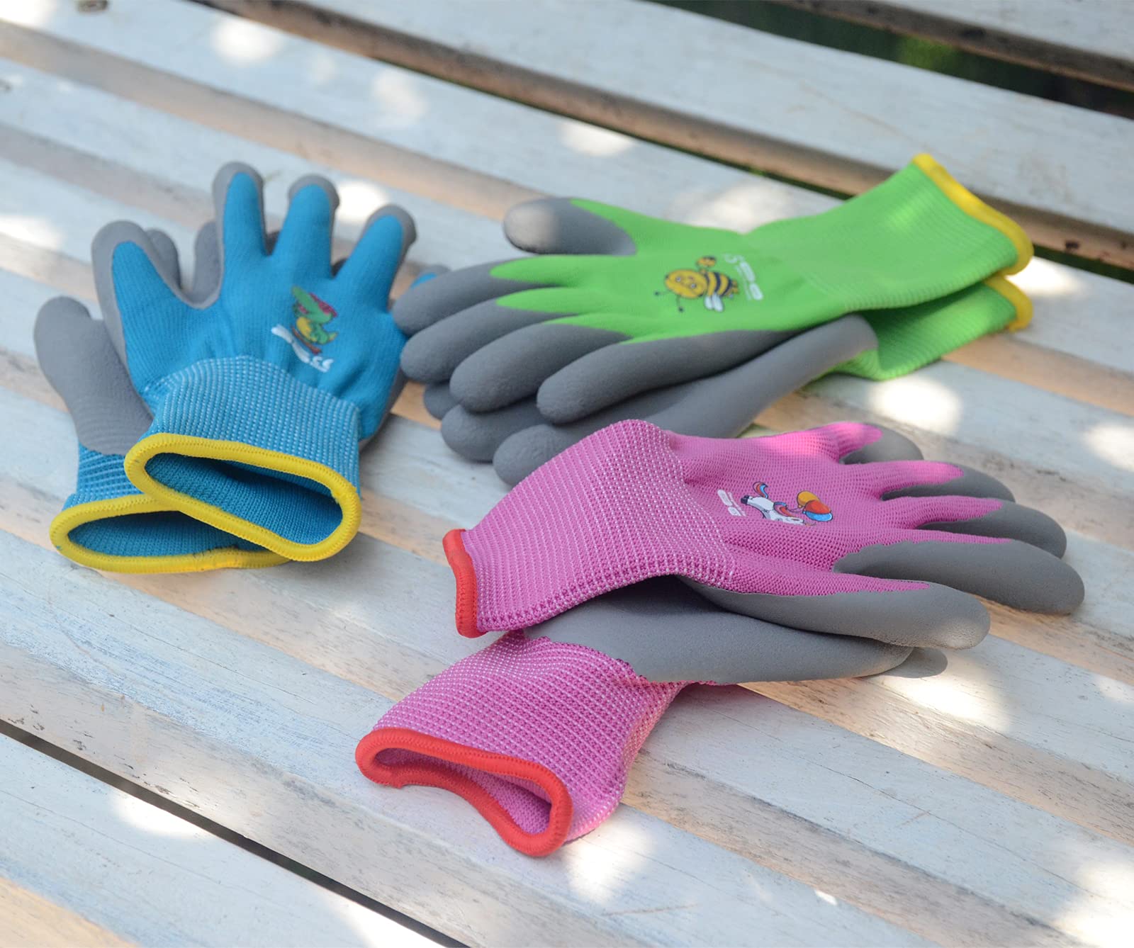 Child wearing KDK gloves in garden with breathable, comfortable fit