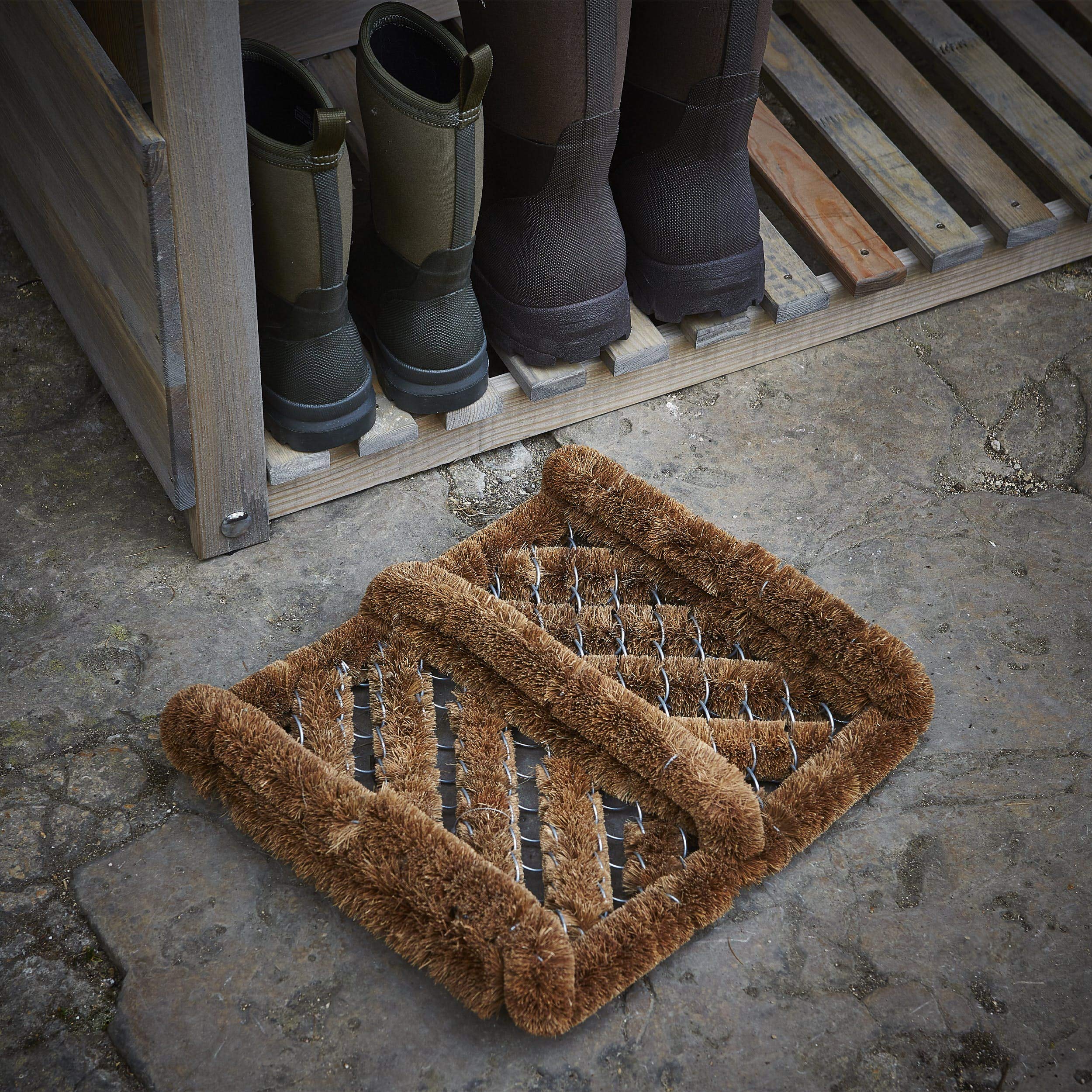 Kempf boot scraper in use at doorway removing dirt