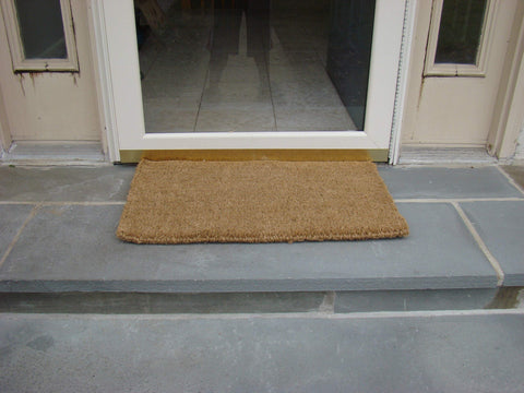 Kempf natural brown coir mat enhances rustic entryway appeal