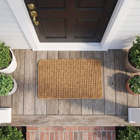 Kempf Dragon Weave doormat in outdoor use at an entryway