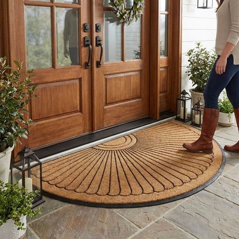 Kempf Sunburst Half Round Doormat greets guests and traps dirt at the threshold.