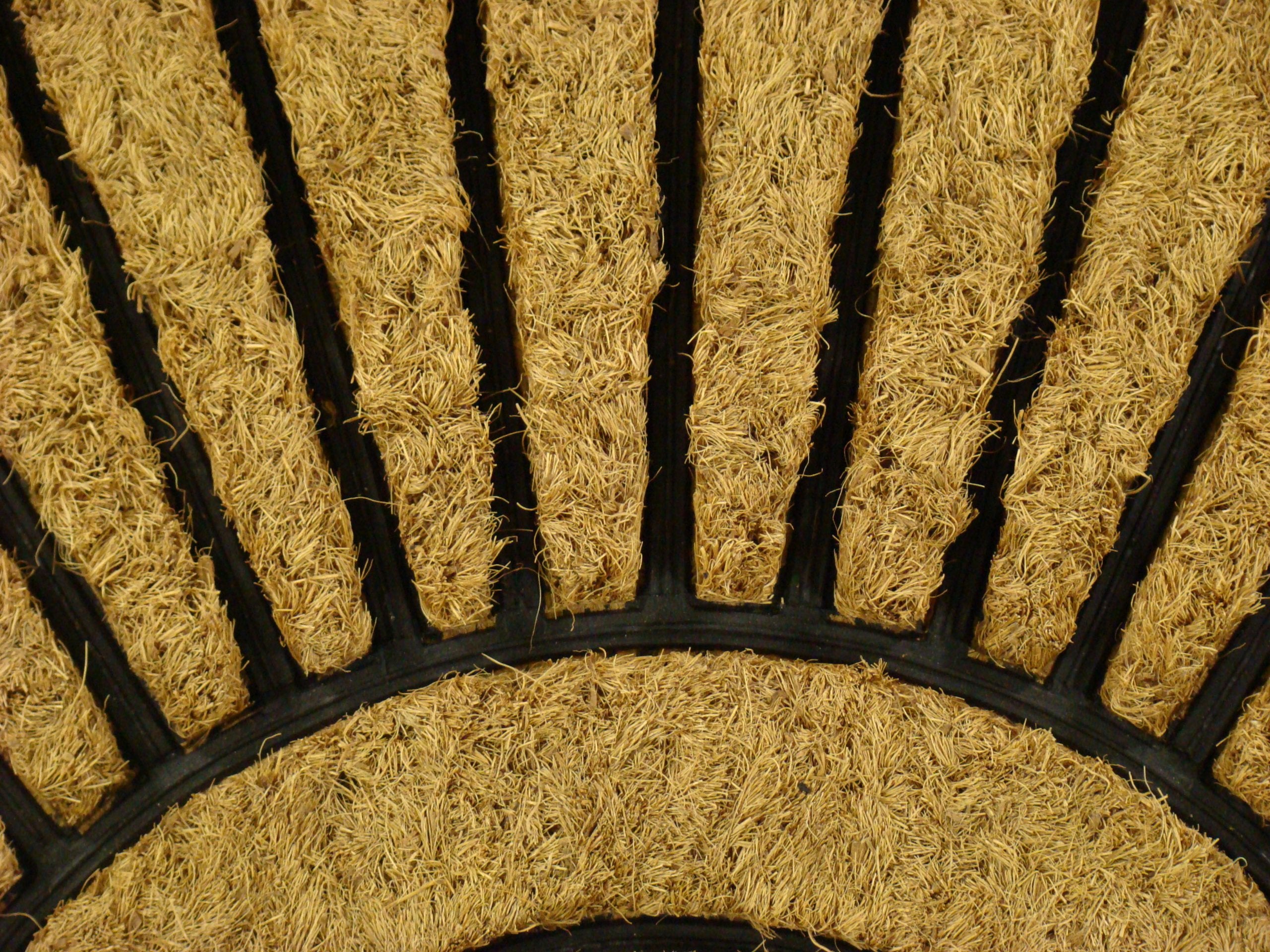 Kempf Sunburst Half Round Doormat outdoors ready for porches and entryways