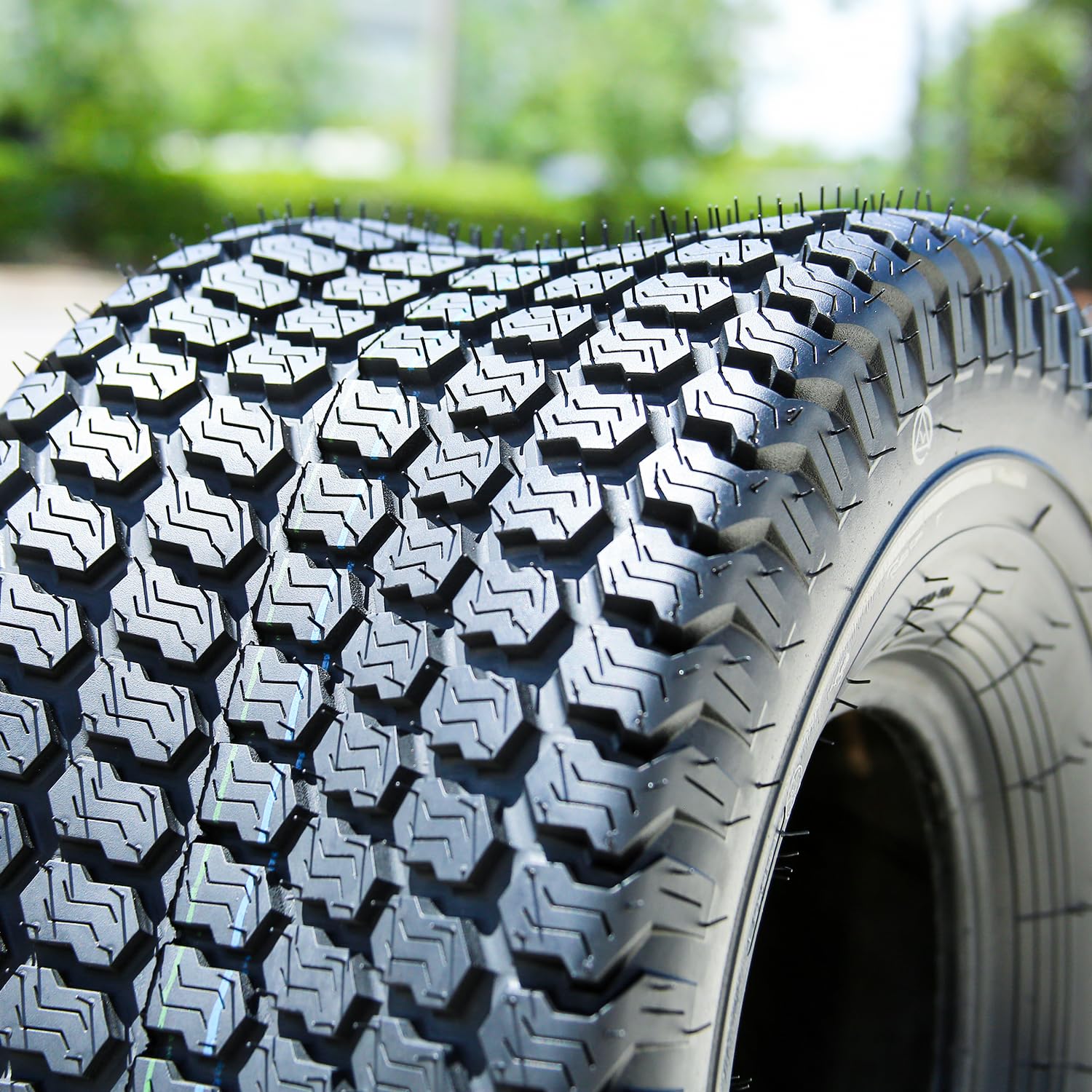 Close-up tread detail on Kenda K500 Super Turf for enhanced grip