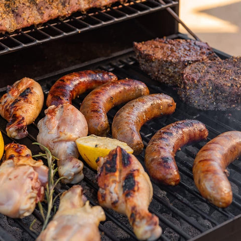Kendane Barrel Charcoal Grill side table provides space for seasonings and prep.
