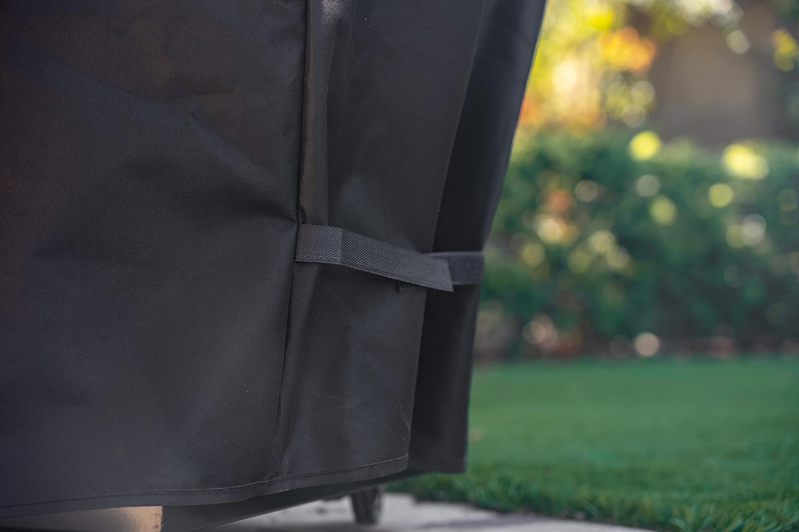 Kenmore 33-inch grill cover easy cleaning with hose rinse and air dry.