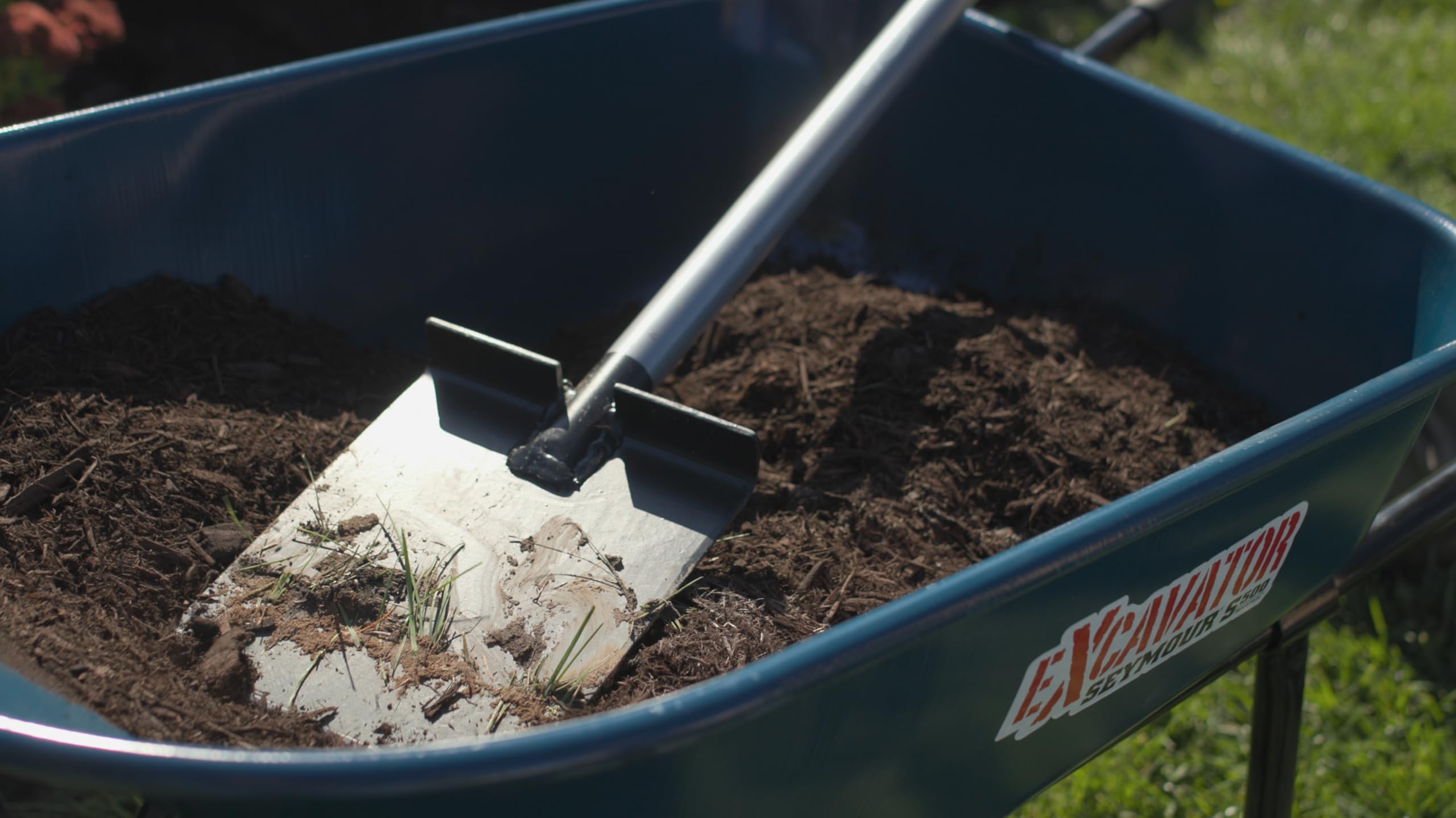 Kenyon S550 trenching action for low-voltage lighting with minimal turf disruption.