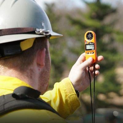 Kestrel 3500FW orange device showing backlit display for quick readings in low light