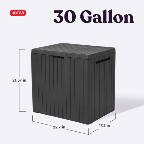 Keter City 30 Gallon storage box lid open with cushions and pool toys